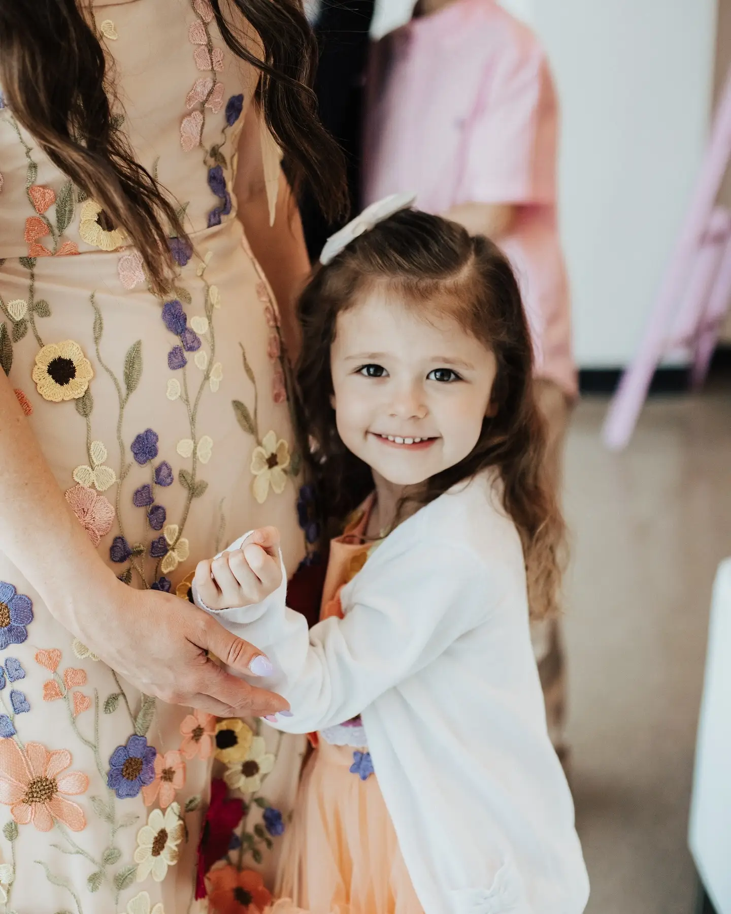 Child smiling at X Kids